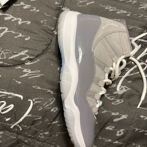 Cool grey worn twice . No physical damage. To small for my kid